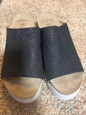 Fly London Black Perforated Slide Wedge Mules